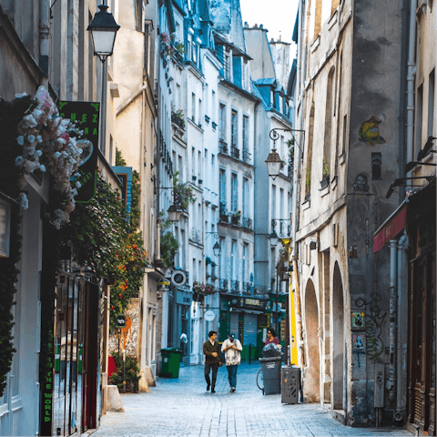 Explore Paris, including nearby Place des Vosges and Le Marais