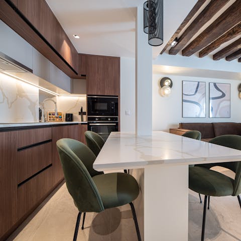 Enjoy a glass of Champagne at the dining table