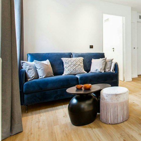 Settle into the living area after exploring the city
