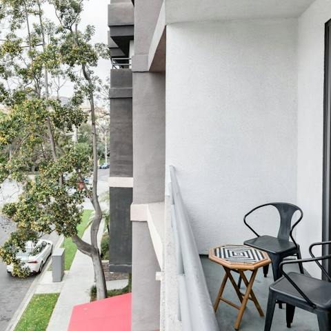 Enjoy some fresh air on the private balcony