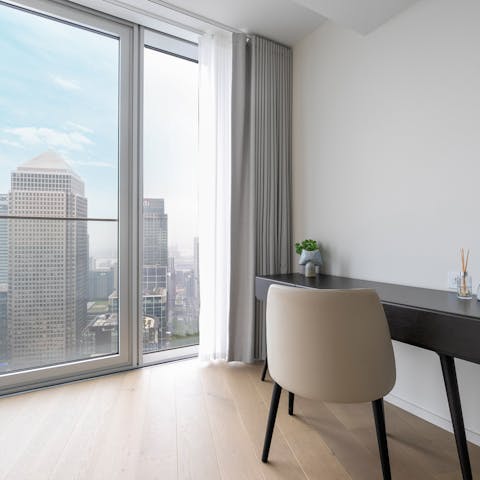 Work with a view of Canary Wharf from the third bedroom