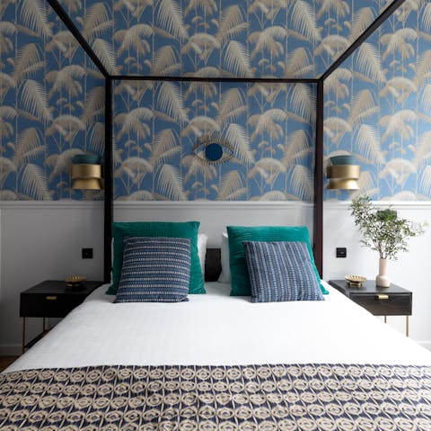 Enjoy a dreamy night's sleep in the elegant four-poster bed