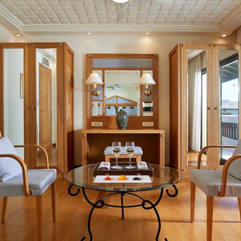 Kick back, relax and enjoy a glass of wine in the stylish living room