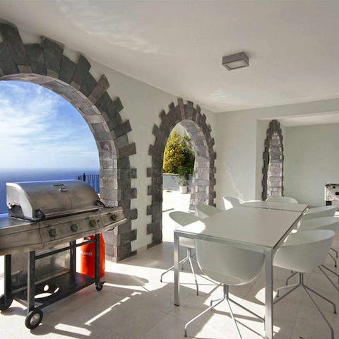 Grill up some locally-caught seafood and enjoy on the dining set on the covered terrace