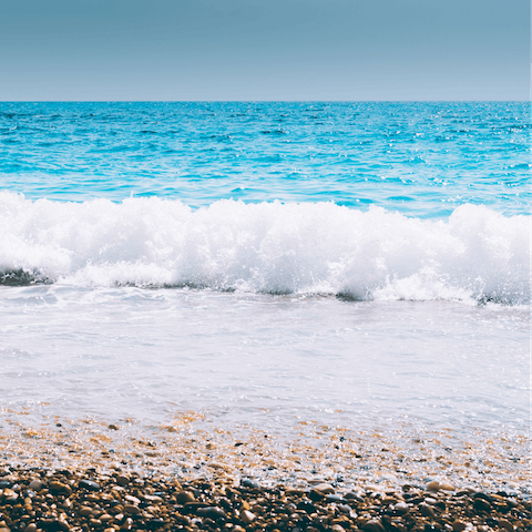 Follow the winding path from the estate down to the nearby pebble beach for a dip in the crystal clear sea
