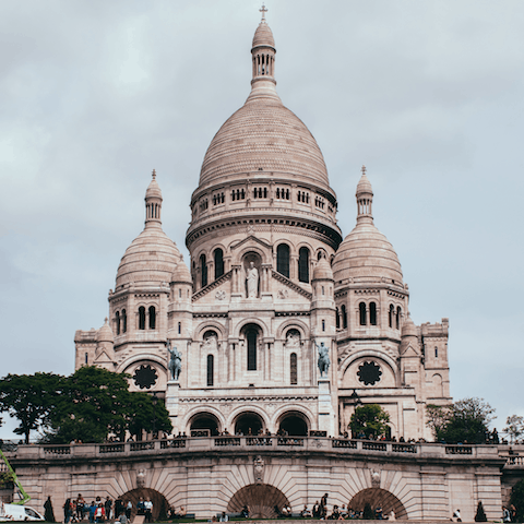 Catch the metro from Strasbourg Saint-Denis to Barbès - Rochechouart and walk for 800 metres to the Sacré-Cœur