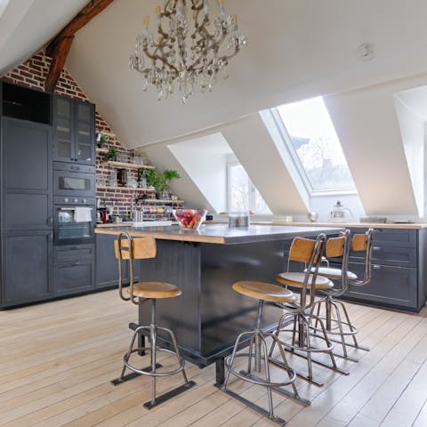 Perch at the breakfast bar with a flaky croissant and cup of coffee