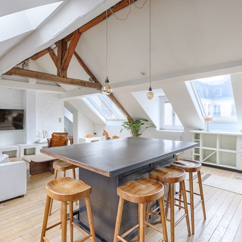 Perch at the breakfast bar with a flaky croissant and cup of coffee