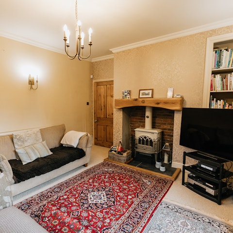 Settle down in front of the wood burner for a movie night