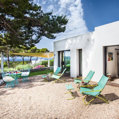 Catch some rays and sip on something refreshing in the deck chairs