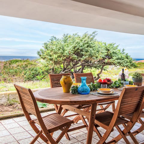 Tuck into an alfresco meal with sea views as your backdrop