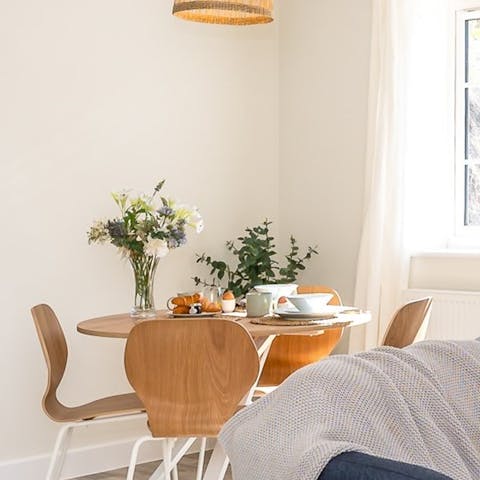 Enjoy biscuits and tea around the dining table