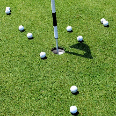 Play a few rounds at the nearby golf course