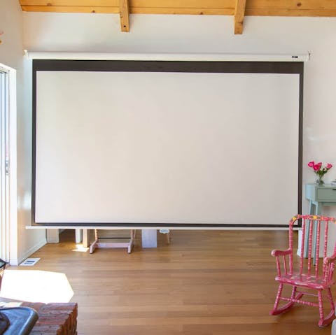 Watch a family film on the home cinema system