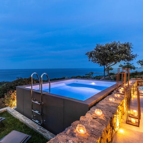 Take an evening dip in the panoramic plunge pool