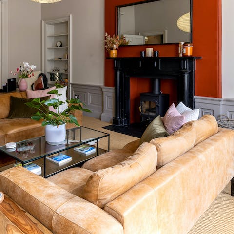 Snuggle up by the fire with a glass of wine in the evening
