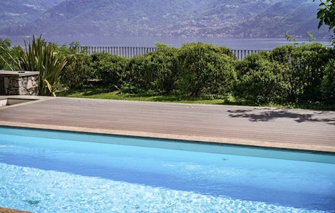 Cool off in the shared pool with Lake Como laid out before you