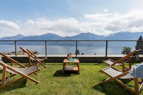 Stretch out on the lawn as Lake Como fills the horizon