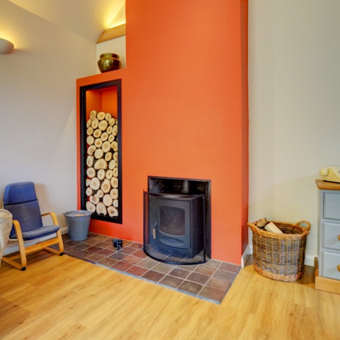 Warm up by the wood burning fire after long days exploring the countryside