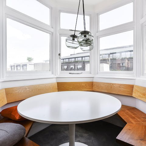 Tuck into tea and scones at the bay window dining table