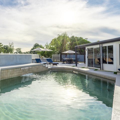 Take a refreshing dip in the swimming pool