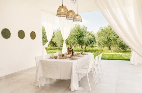 Enjoy a leisurely alfresco lunch overlooking the garden