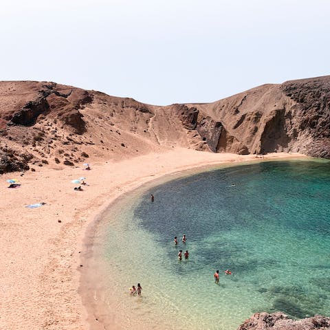 Head to Playa de Papagayo – less than a fifteen-minute walk away