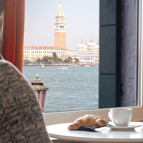 Admire stunning Venetian views over breakfast