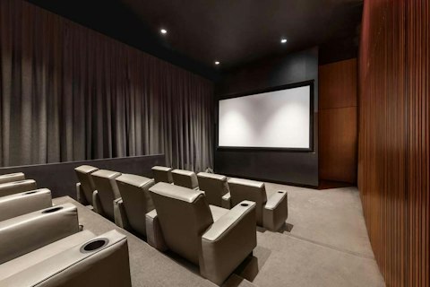 Screen a film in the building's cinema room