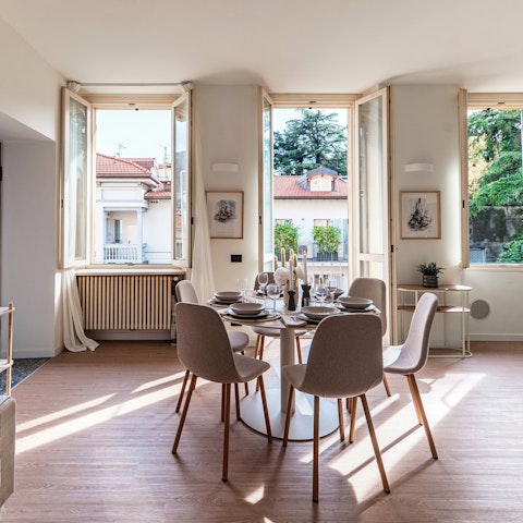 Enjoy a glass of Italian wine at the dining table