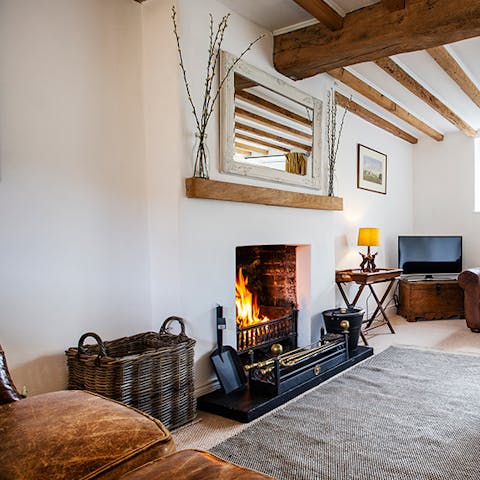Snuggle up on the sofas in front of the open fire