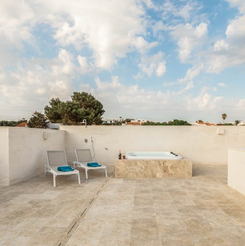 Sit back and relax in the rooftop jacuzzi