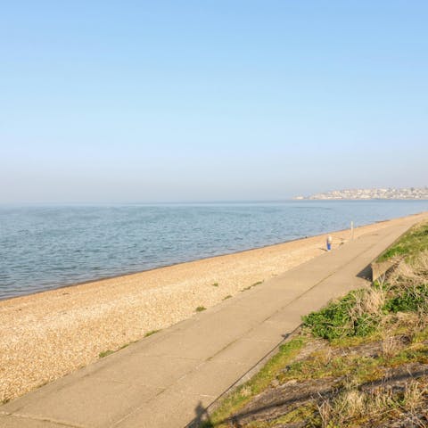 Stroll along Swalecliffe Beach, accessible from the garden