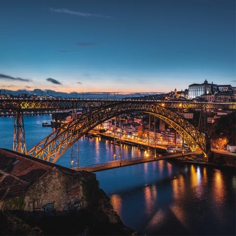 Cross the Luís I Bridge to visit the city's famous port cellars