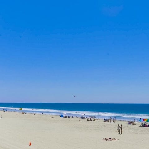 Take a stroll along the nearby sandy beach
