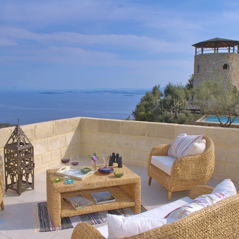 Enjoy evening sundowners on the chic roof terrace