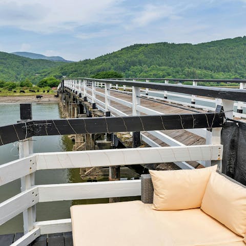 Enjoy incredible views across the Mawddach estuary from the terrace