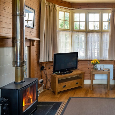 Light the fire and get cosy with drinks in the living room