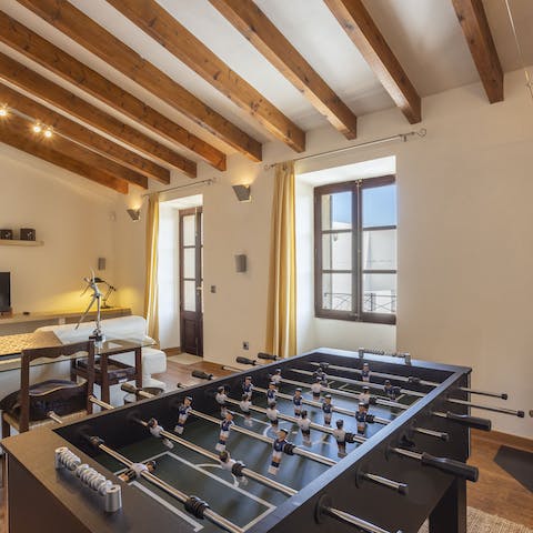 Play a few matches or set up a whole tournament on the football table