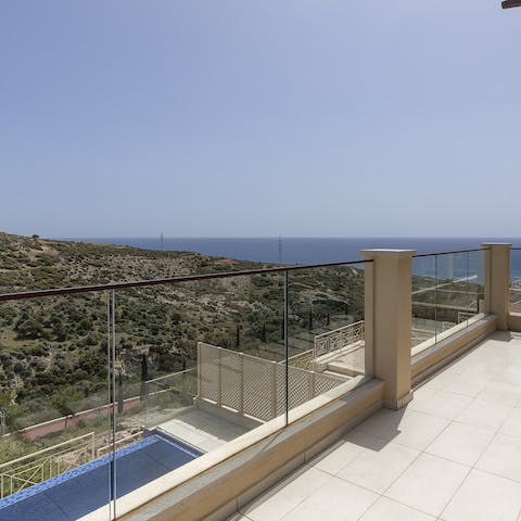Take a cold cocktail up to your private balcony and enjoy the ocean views