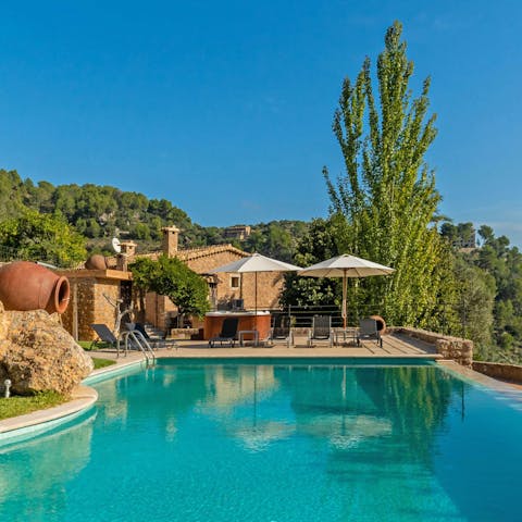 While away sunny afternoons in the private pool