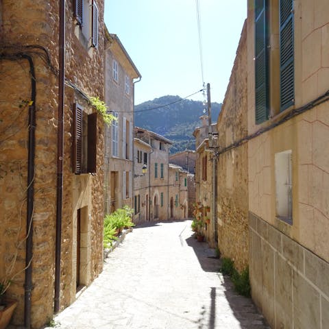 Explore the authentically Mallorcan town of Mancor de la Vall, a four-minute drive away