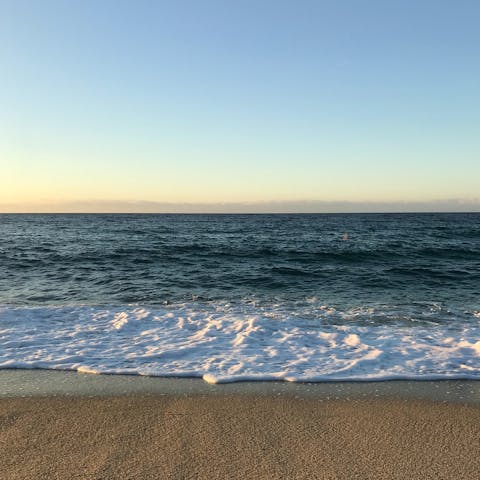 Spend a day at sandy Platja de Muro, just under forty minutes away by car