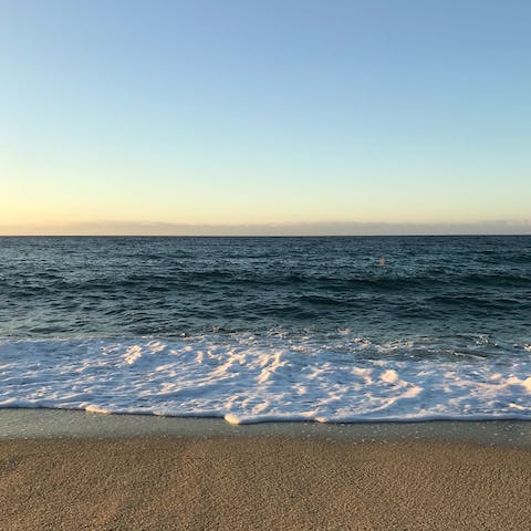 Spend a day at sandy Platja de Muro, just under forty minutes away by car