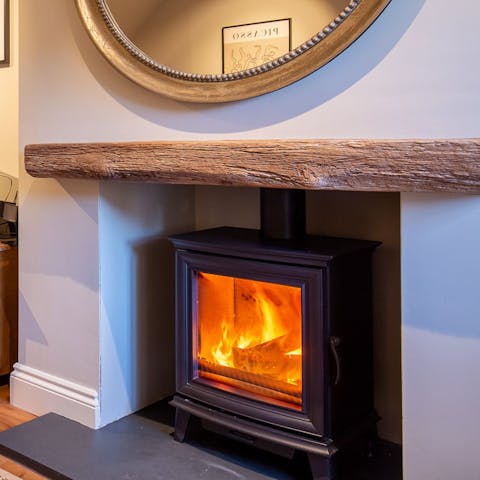 Light up the wood-burning fire and curl up with an Earl Grey in the lounge
