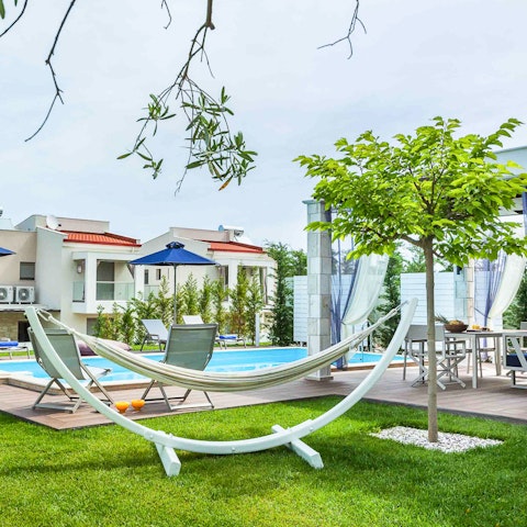 Read all evening in this hammock by the tree