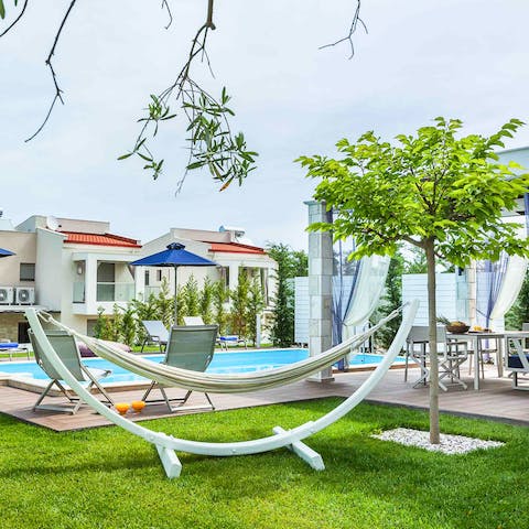 Read all evening in this hammock by the tree