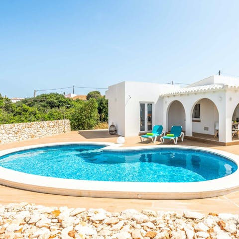 Bask in the sunshine by the private pool