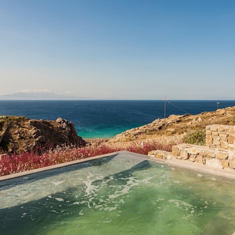 Gaze out at the ocean from the pool