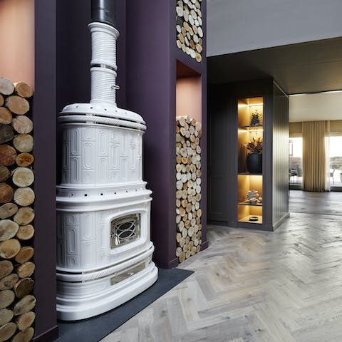 Get the fire going in this statement wood-burning stove and get comfortable